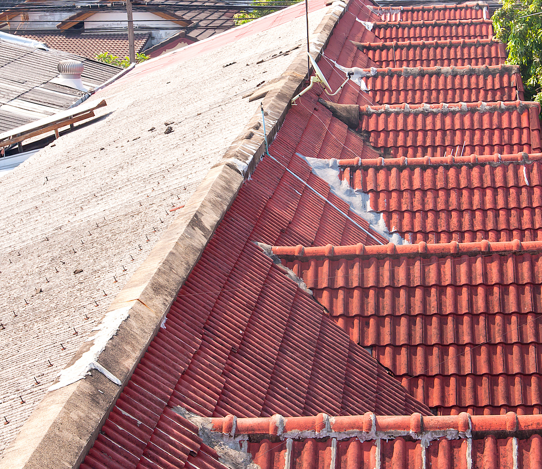 A before-and-after image of a school’s roof restoration.