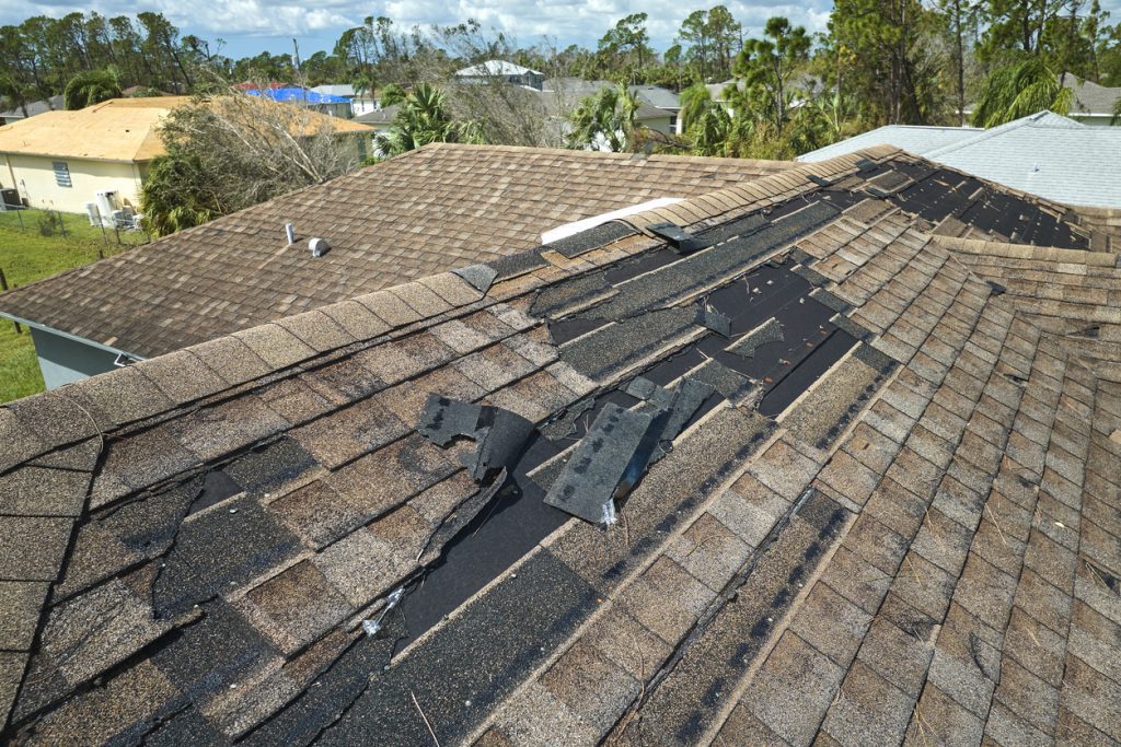 fake wind damage shingles